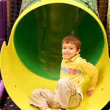 Sidebar Image 03 - Boy in Tunnels - a first grade boy playing in... Sidebar Image 03 - Boy in Tunnels - a first grade boy playing in...